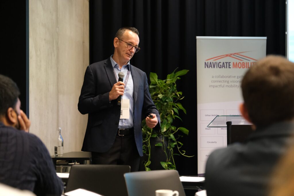 speaker interacting with his audience at the conference